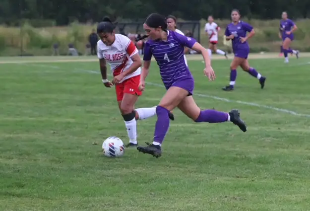 Player Kicking Ball